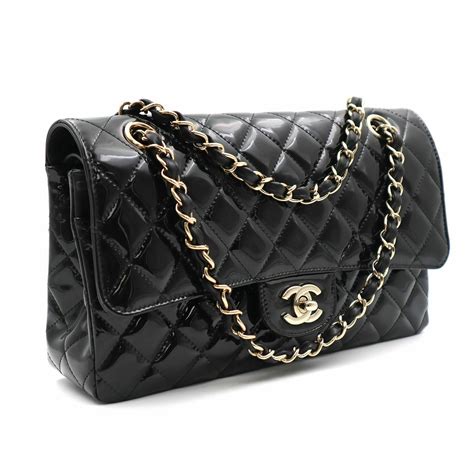 chanel black quilted handbag|Chanel black classic quilted handbag.